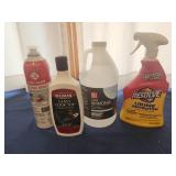 Mostly full cleaning supplies, fire spray