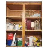 Contents of cabinet, vases, candle holder,