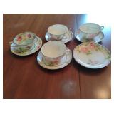 Vintage hand painted tea cups and saucers