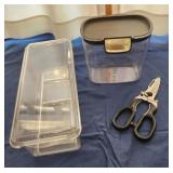 Plastic containers and kitchen scissors