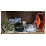 Shelf Contents- Liscense Plates,  Battery