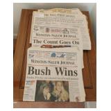 Vintage newspapers including Bush, World Trade