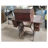 Antique Singer sewing machine on wheels