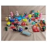 Various toys including Kermit the Frog and