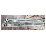 2 new brown 30 in -52" tension rods