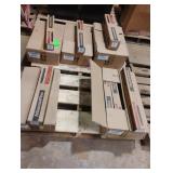 Gas charged shock absorbers