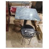 2 metal chairs with vinyl cushions with table