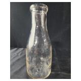 vintage glass milk bottle, early to mid-1900s.