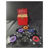 Fifty vintage 45 records and case