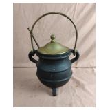 Cast iron smudge pot with brass lid and pumice