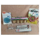Dip clip, fish scaler, toothpicks and drinking