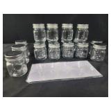 Lot of 17 small glass jars with blank labels