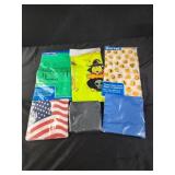 Packs of disposable table covers and napkins,