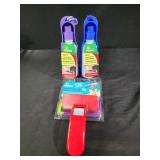 2 traveling pet water bottles and pet brush