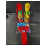 2 traveling pet water bottles and pet brush