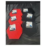 Six silicone pot holders and trivets, red and