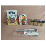 Tooth picks, dip clip, veggie dude and a fish