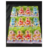 12 Sesame street pacifiers and pacifier holders