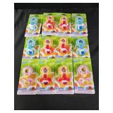 12 Sesame street pacifiers and pacifier holders