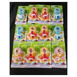 12 Sesame street pacifiers and pacifier holders