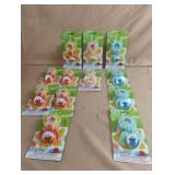 Sesame Street pacifier and holders. 12 total