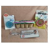 Dip clip, fish scaler, toothpicks and drinking