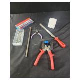 Sharpening stone, crimping tool, screws.