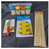 Toothpicks, corn holders. Cheese knife. Skewers