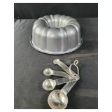 Kitchen aid measuring spoons and bundt cake pan