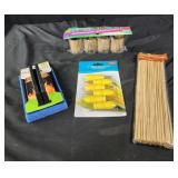 Toothpicks, corn holders. Grill scrub pad.