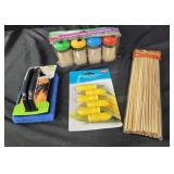Toothpicks, corn holders. Grill scrub pad.