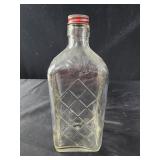 Vintage glass wine bottle embossed grapes, cross