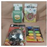 Corn holders, microwave egg muffin pan, dip clip