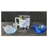 Frosted glass swan, Barnes and Noble floral mug.