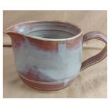 Pottery pitcher. Won