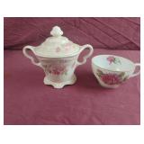 Vintage porcelain tea cup and sugar bowl