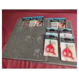 2 litter trap mats and 4 cat claw clippers