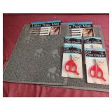 2 litter trap mats and 4 cat claw clippers