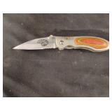Pocket knife with an eagle on the 3" blade