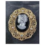 Ornate Vintage Black Oval Cameo Brooch goldtone