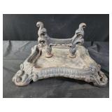 Antique cast iron boot scraper.