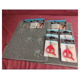 2 litter trap mats and 4 cat claw clippers