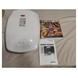 George Foreman Fat Grilling Machine. Powers on