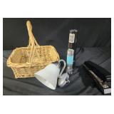 Basket. Stapler, flashlights, plug in light