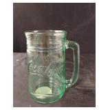 Coca-Cola drinking glass mug. Green in color