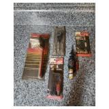 Tubing bender. Spark Plug tester. Spark Plug wire