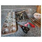 Muffin tins. Knives, measuring spoons. Flatware,