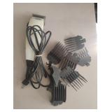 Performer Wahl electric razor with accessories.