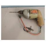 Black & Decker 38" electric drill. Powers on