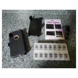Otter phone case, pill organizer. Bobby pins,